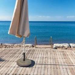 Tangkula 18" Patio Resin Umbrella Base, 24 LBS Outdoor Heavy Duty Round Umbrella Base -Tangkula GUEST b135b7b1 ff19 4f38 a8e1 75fe5840f4cd